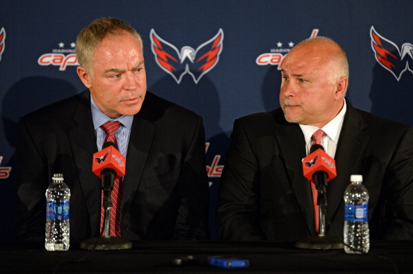 WASHINGTON, DC - MAY 27: General Manager Brian MacLellan (L) answers questions as coach Barry Trotz, both of the Washington Capitals, looks on during their introductory press conference at the Verizon Center on May 27, 2014 in Washington, DC. The Washington Capitals introduced MacLellan as the new general manager and Trotz as the new head coach during the press conference. (Photo by Patrick Smith/Getty Images)