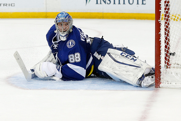 TAMPA, FL - MAY 24:  Andrei Vasilevskiy #88 of the Tampa Bay Lightning looks on as he gives up a goal to Bryan Rust #17 of the Pittsburgh Penguins during the third period in Game Six of the Eastern Conference Final during the 2016 NHL Stanley Cup Playoffs at Amalie Arena on May 24, 2016 in Tampa, Florida.  (Photo by Mike Carlson/Getty Images)