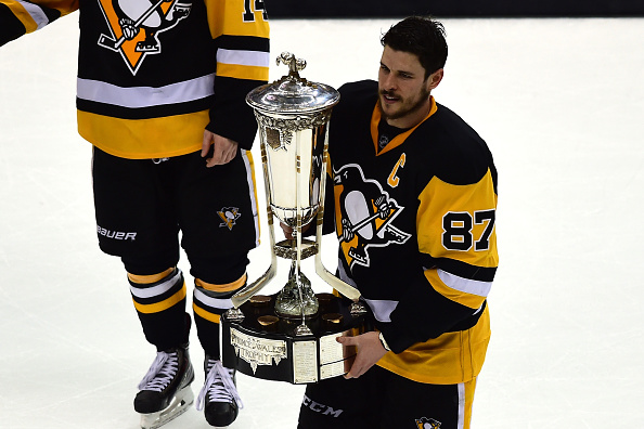 PITTSBURGH, PA - MAY 26:  Sidney Crosby #87 of the Pittsburgh Penguins celebrate by holding the Prince of Wales Trophy after defeating the Tampa Bay Lightning in Game Seven of the Eastern Conference Final with a score of 2 to 1 during the 2016 NHL Stanley Cup Playoffs at Consol Energy Center on May 26, 2016 in Pittsburgh, Pennsylvania.  (Photo by Matt Kincaid/Getty Images)