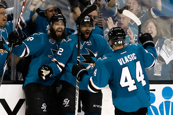 SAN JOSE, CA - JUNE 04:  Joel Ward #42 of the San Jose Sharks celebrates his goal with Brent Burns #88 and Marc-Edouard Vlasic #44 against the Pittsburgh Penguins during the third period in Game Three of the 2016 NHL Stanley Cup Final at SAP Center on June 4, 2016 in San Jose, California.  (Photo by Christian Petersen/Getty Images)